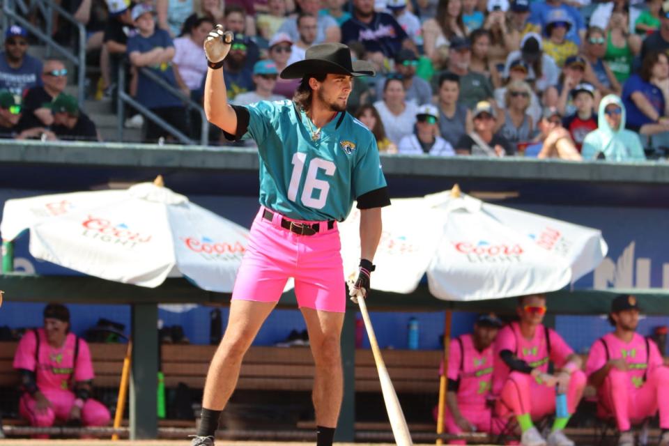 A player for the Party Animals goes up to bat while wearing a Jaguars jersey in a game against the Savannah Bananas in 2023 at 121 Financial Ballpark in Jacksonville.