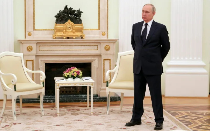 Russian president Vladimir Putin is reported to be 5 foot 7 inches tall - AP