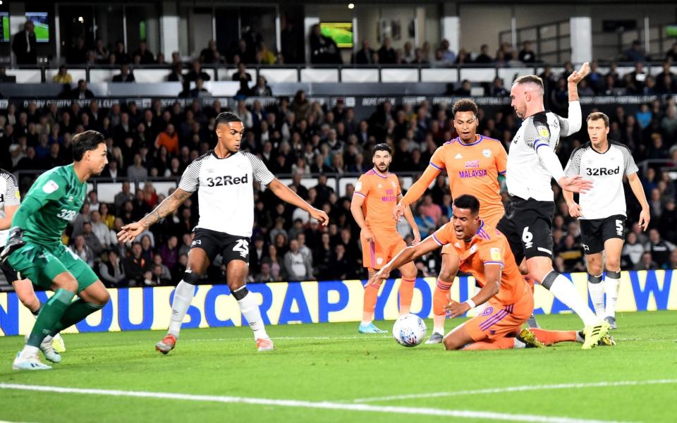 Cardiff's Robert Glatzel is fouled by Derby's Richard Keogh to win a penalty for Cardiff - Getty Images Europe