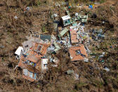 <p>A completely destroyed house is seen 12 days after Hurricane Irma ripped through the island, in the Cruz Bay area of St. John, U.S. Virgin Islands September 16, 2017. (Photo: Jonathan Drake/Reuters) </p>