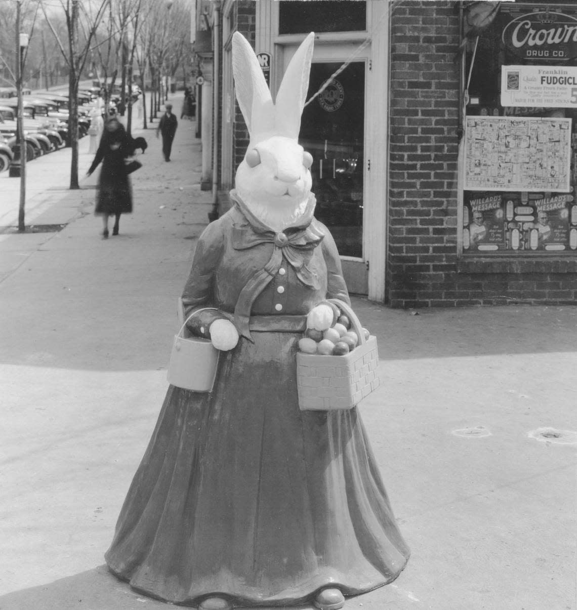 Crowds disappeared, but the Easter Bunny still remains around Crestwood Shops, outside of Crown Drug Store in 1922. State Historical Society of Missouri