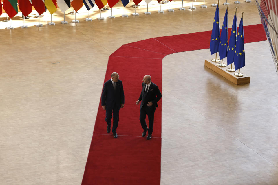 European Council President Charles Michel, right, speaks with author of the High-Level Report on the future of the Single Market, Enrico Letta, as they arrive for an EU summit in Brussels, Thursday, April 18, 2024. European Union leaders vowed on Wednesday to ramp up sanctions against Iran as concern grows that Tehran's unprecedented attack on Israel could fuel a wider war in the Middle East. (AP Photo/Omar Havana)