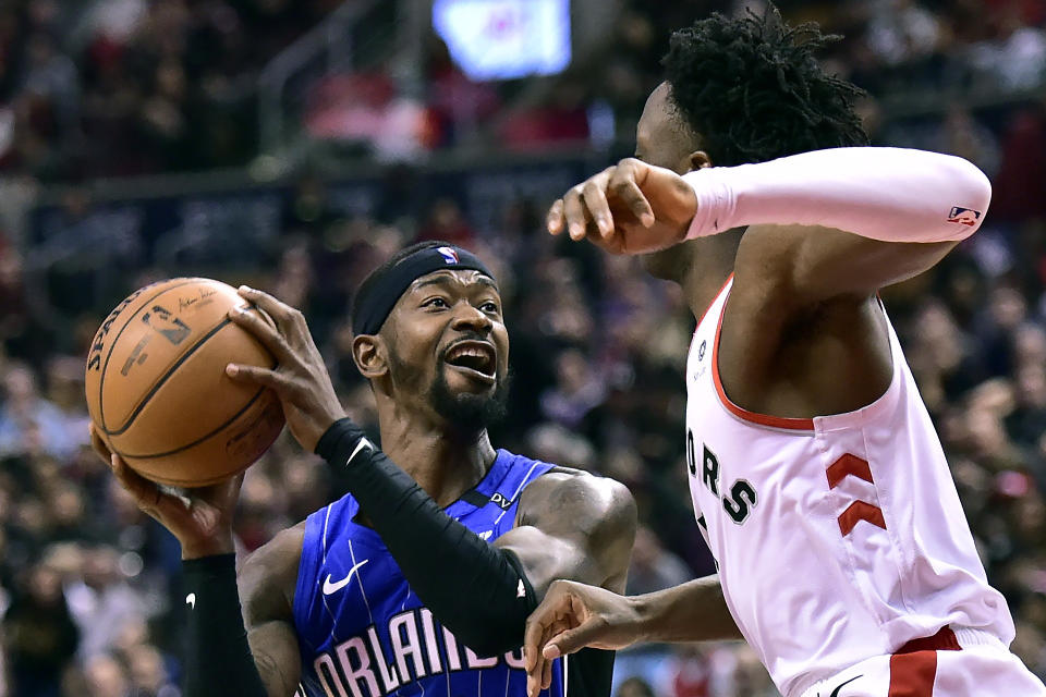 Orlando Magic guard Terrence Ross (31) looks to keep the ball away from Toronto Raptors forward OG Anunoby (3) as he looks for the shot during the second half NBA basketball game, Sunday, Feb. 24, 2019 in Toronto (Frank Gunn/The Canadian Press via AP)