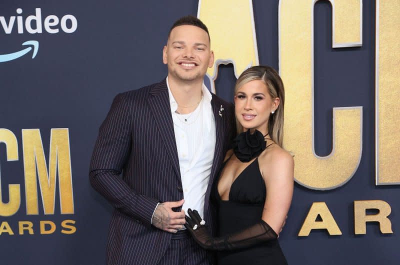 Kane Brown (RL) and Katelyn Brown attend the Academy of Country Music Awards in 2022. File Photo by James Atoa/UPI