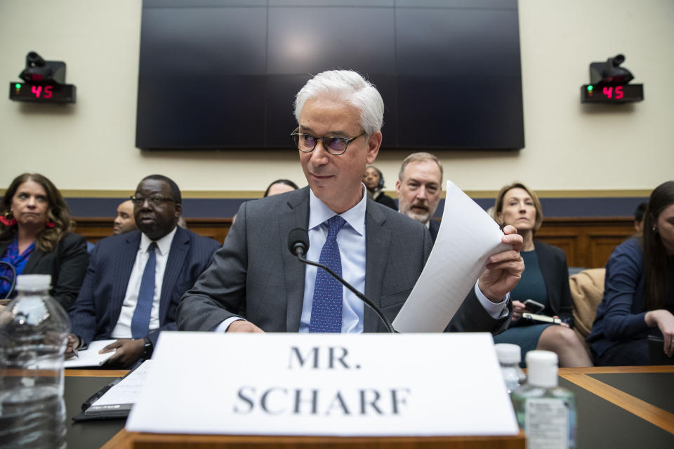 Wells Fargo CEO and President Charles Scharf is seated before he testifies during a hearing of the House Financial Services Committee, on Capitol Hill, Tuesday, March 10, 2020, in Washington. (AP Photo/Alex Brandon)