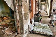 <p>Debris is piled up in front of the house of Daylin Rodriguez at Havana’s Malecon waterfront, three days after Hurricane Irma passed over Cuba, on Sept. 12, 2017, in Havana, Cuba. Hundreds of thousands still have no power as Cuba is recovering from the impact by hurricane Irma. (Photo: Sven Creutzmann/Mambo photo/Getty Images) </p>