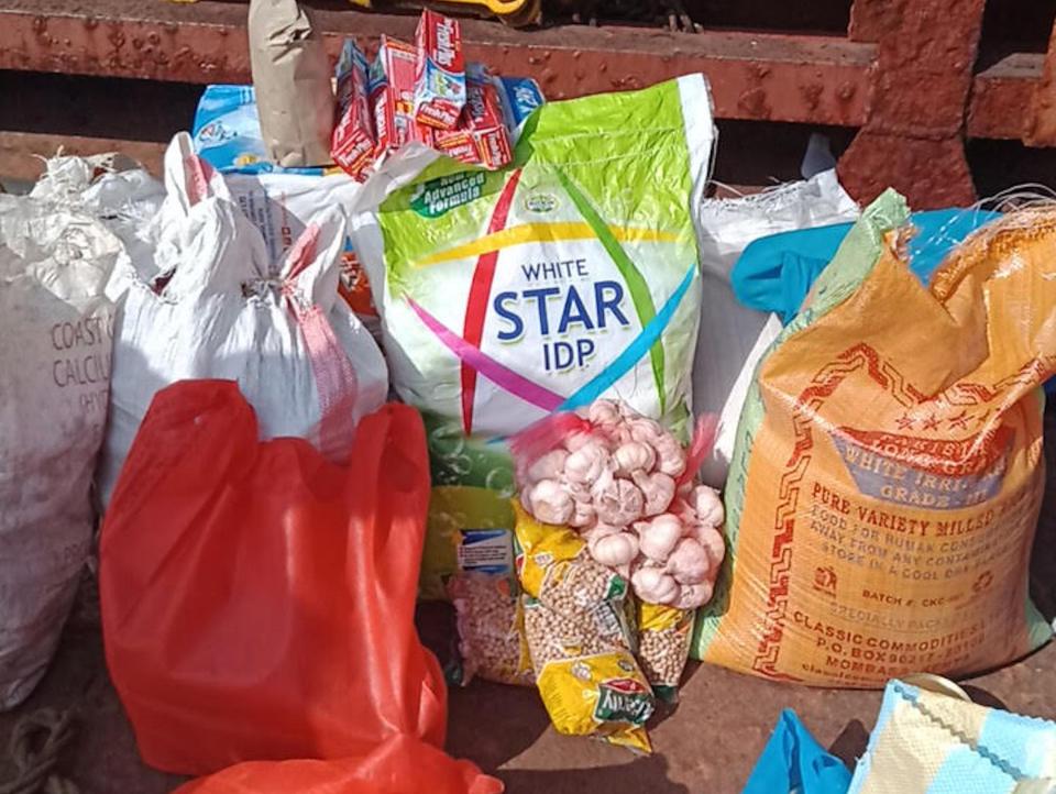 Several bags of food supplies on the deck of the MV Jinan, for the crew.