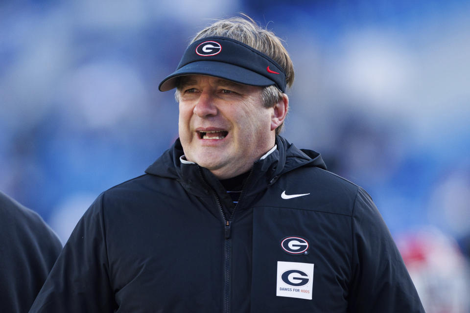 Georgia head coach Kirby Smart talks to his team before an NCAA college football game in Lexington, Ky., Saturday, Nov. 19, 2022. (AP Photo/Michael Clubb)