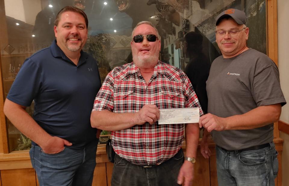 Manitowoc County Fish & Game Protective Association will again be a major sponsor of the wood duck and bluebird house project headed by the Maribel Sportsman’s Club. Pictured from left: Dan Dufek, president of Manitowoc County Fish & Game, looks on as Bob Schuh of the Maribel Sportsman’s Club accepts the $2,020 Check from Randy Peters, treasurer of Manitowoc County Fish & Game.