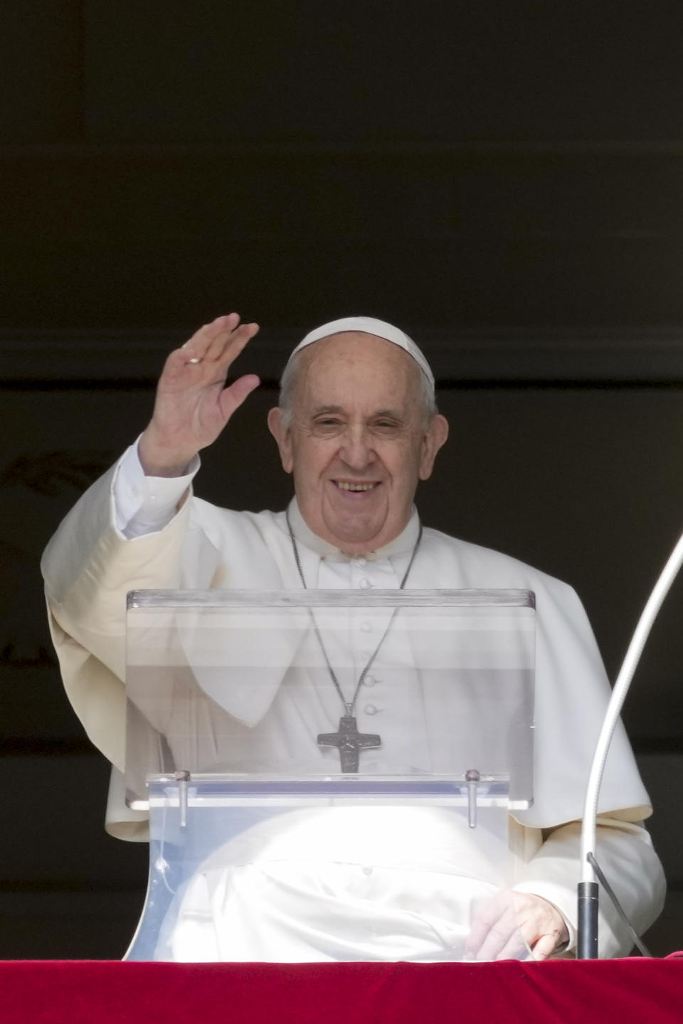 Pope Francis delivers his blessing as he recites the Angelus noon prayer from the window of his studio overlooking St.Peter's Square, at the Vatican, Sunday, Oct. 24, 2021. (AP Photo/Andrew Medichini)