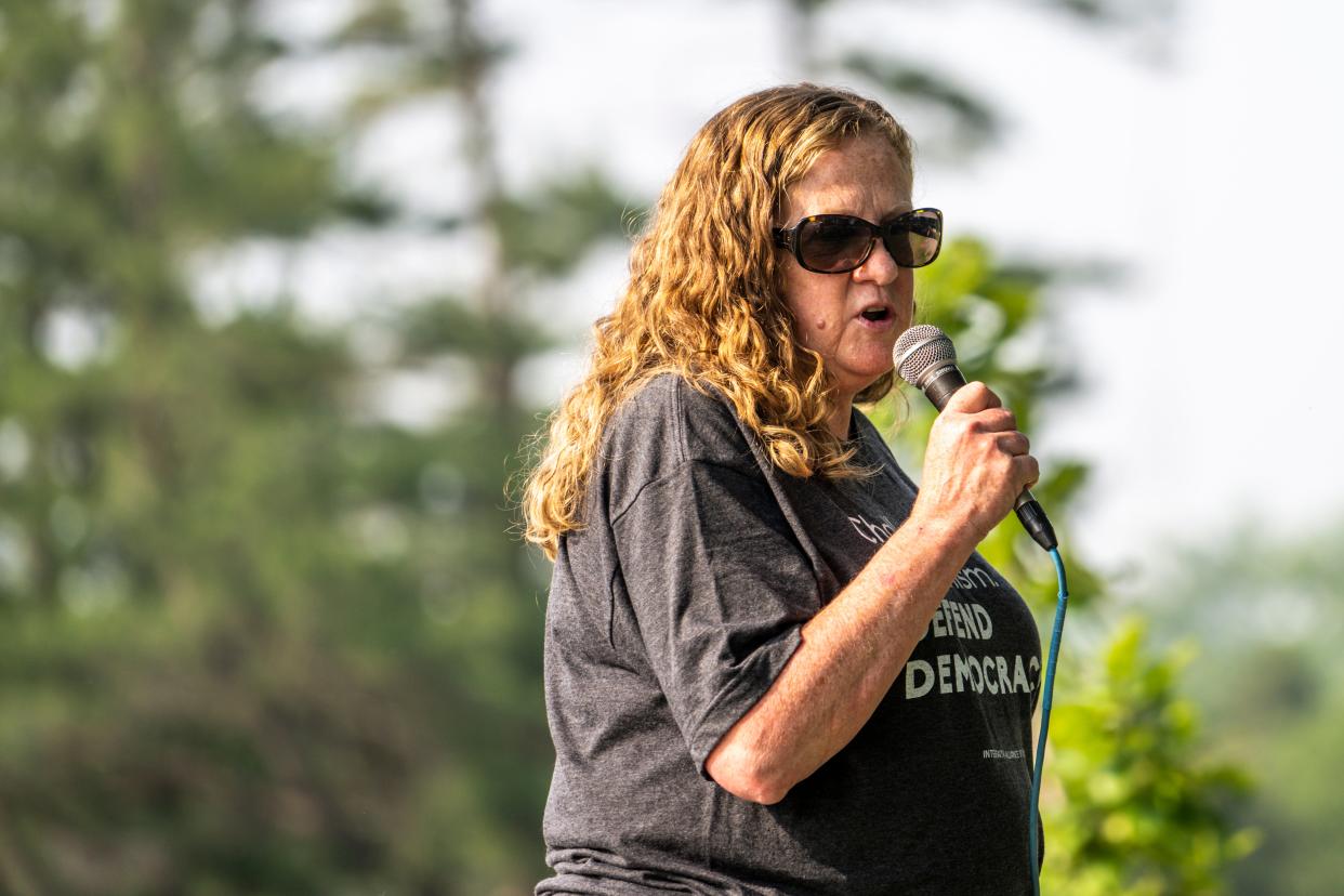 Connie Ryan, executive director of Interfaith Alliance of Iowa, speaks during a celebration rally at the Des Moines Biergarten at Water Works Park on June 16 in Des Moines after an Iowa Supreme Court deadlock permanently blocked a law restricting most abortions after the sixth week of pregnancy.