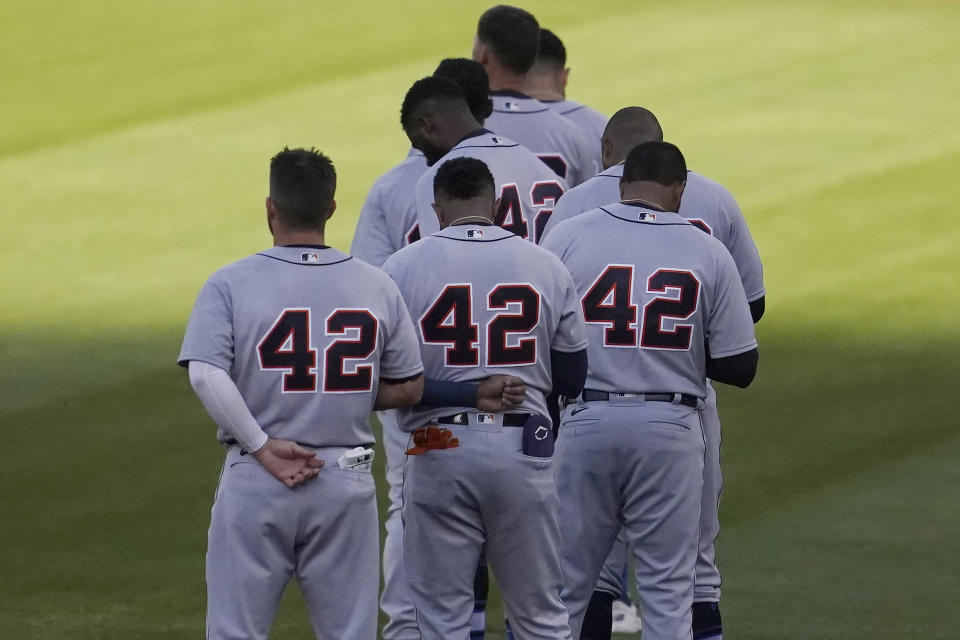 Detroit Tigers players wear No. 42 in honor of Jackie Robinson Day before a baseball game against the Oakland Athletics in Oakland, Calif., Thursday, April 15, 2021. (AP Photo/Jeff Chiu)