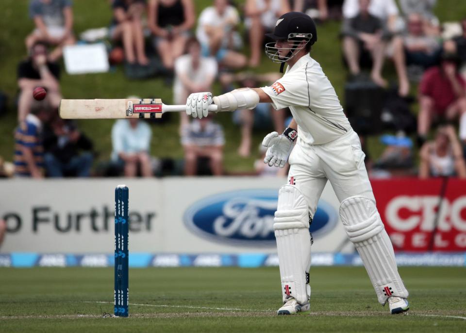 New Zealand's Kane Williamson keeps the ball away from his wicket during day one of the second international test cricket match against India at the Basin Reserve in Wellington, February 14, 2014.