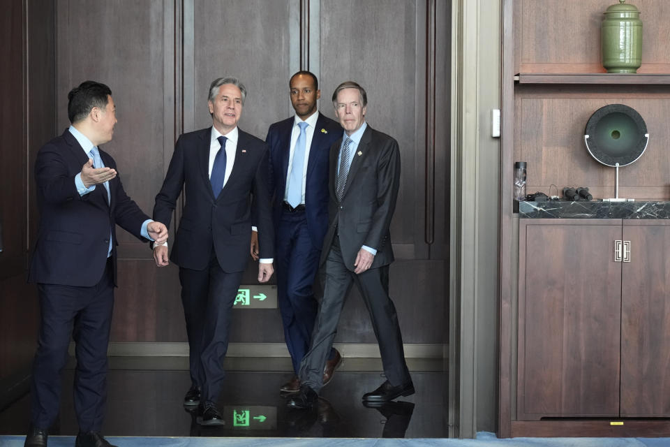 U.S. Secretary of State Antony Blinken, second left, and U.S. Ambassador to China Nicholas Burns, far right, arrive at the Grand Halls to meet with Shanghai Party Secretary Chen Jining on Thursday, April 25, 2024, in Shanghai, China. (AP Photo/Mark Schiefelbein, Pool)