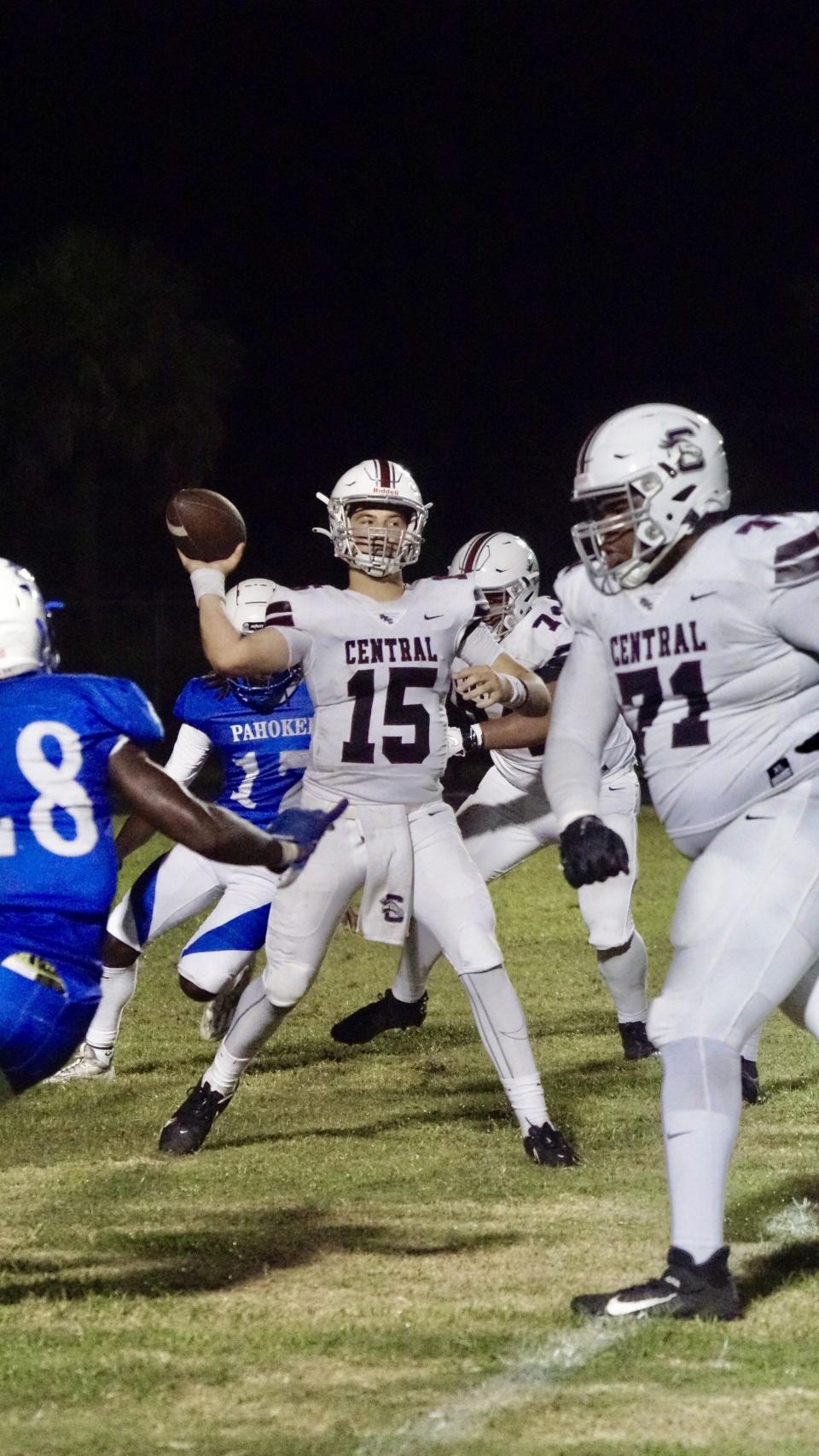Palm Beach Central quarterback Caleb Butler (15) passes against Pahokee in a football game on Thursday, Sept. 14, 2023 in Pahokee.