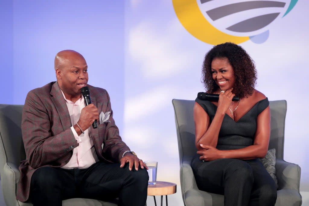 Michelle Obama (pictured in October 2019) hosts her brother Craig Robinson on her Spotify podcast  (Getty Images)