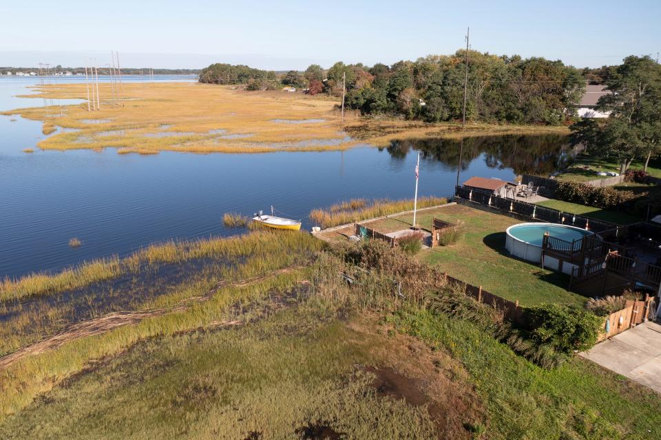 In Warren, with large tracts of land only two feet above sea level the ocean creeps into backyards, basements and across property lines