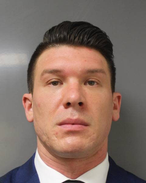 This June 6, 2020 photo provided by the Erie County District Attorney's Office in Buffalo, N.Y., shows suspended Buffalo police officer Robert McCabe. Criminal charges have been dropped against McCabe, one of two police officers seen on video last spring shoving a 75-year-old protester to the ground in Buffalo, New York, prosecutors said Thursday, Feb. 11, 2021. (Erie County District Attorney's Office via AP)