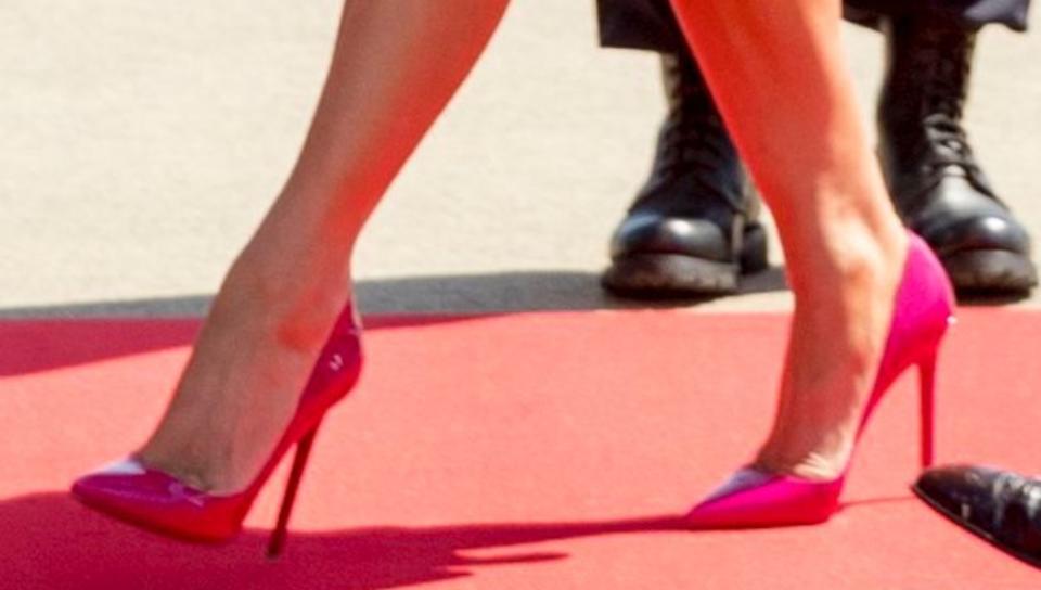 Melania Trump wearing hot pink patent Christian Louboutin ‘So Kate’ pumps. - Credit: Shutterstock