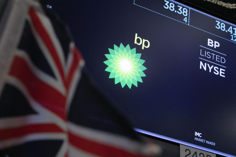 The logo for BP appears above a trading post on the floor of the New York Stock Exchange, Tuesday, Oct. 29, 2019. Stocks are off to a slightly lower start on Wall Street as communications and energy companies fall. (AP Photo/Richard Drew)