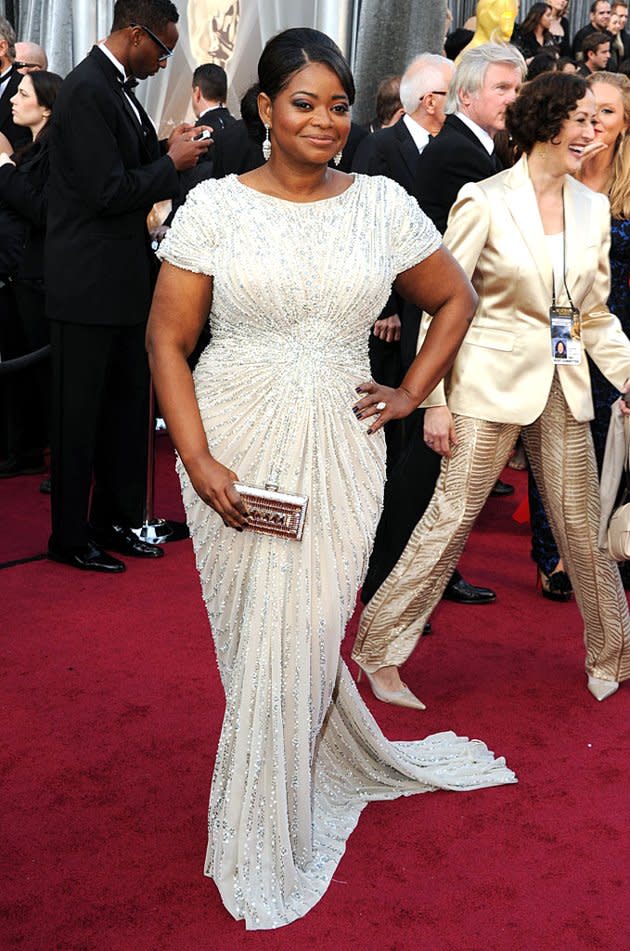 Octavia Spencer <br>Grade: A <br><br>Before she nabbed the award for Actress in a Supporting Role, “The Help” star had already won on the red carpet in an off-white jeweled Tadashi Shoji gown that gathered at the waist, paired with Jimmy Choo shoes and Judith Leiber jewels. Although Octavia had three different options for her Oscars look, she wisely went with the Japanese designer, who has dressed her for each of the awards shows this season.