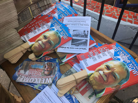 FILE PHOTO - Placards bearing the image of Oscar Lopez Rivera are seen readied for a party, after his release from house arrest in Puerto Rico, ahead of his return to Chicago, Illinois, U.S. on May 18, 2017. REUTERS/Timothy McLaughlin/File Photo