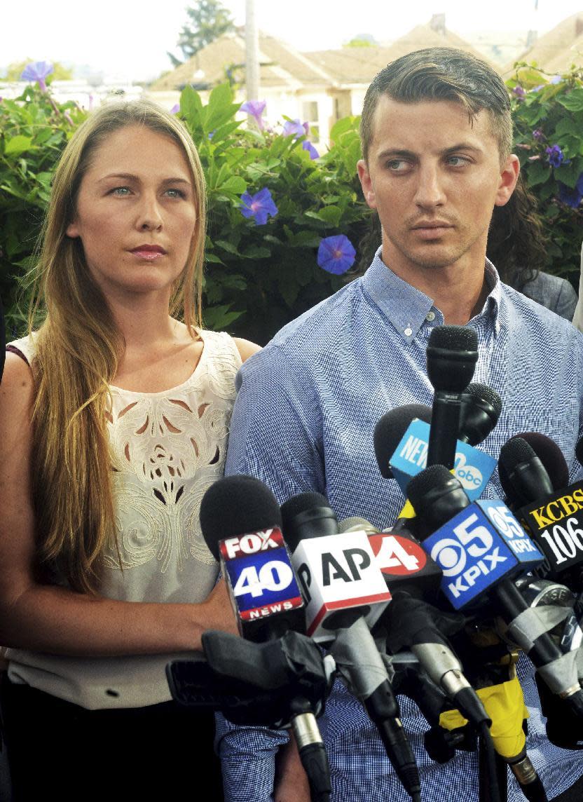 FILE - In this July 13, 2015 file photo, Denise Huskins, left, and her boyfriend Aaron Quinn appear at a news conference in Vallejo, Calif. Matthew Muller, a disbarred Harvard University-trained attorney, faces decades in prison when he is sentenced Thursday, March 16, 2017, for kidnapping Huskins in a scheme so elaborate and bizarre that police in California initially dismissed it as a hoax. (Mike Jory/The Times-Herald via AP, File)