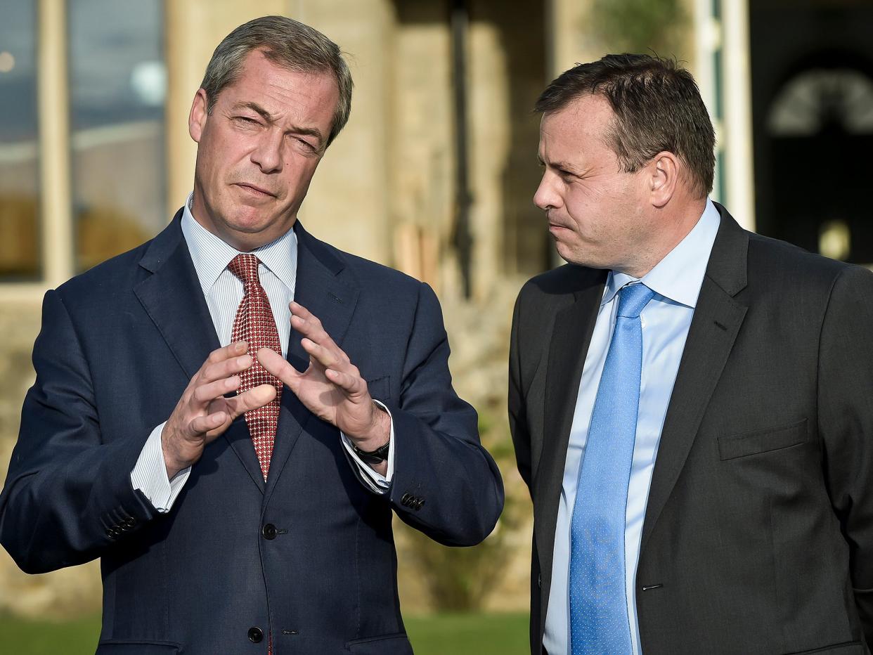 Nigel Farage and Arron Banks (r) were reported to be planning a