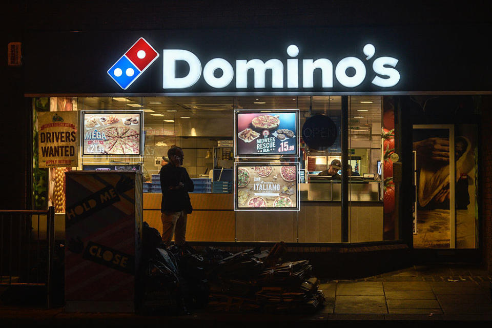A local Domino's Pizza at night