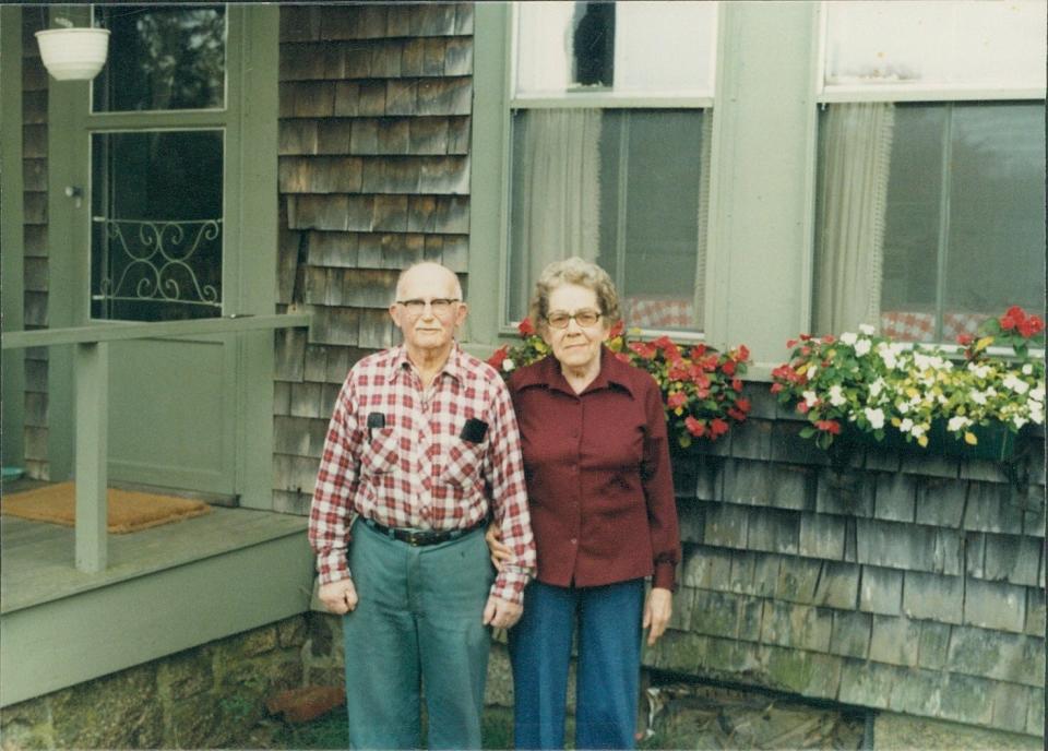 Percy and Agnes Douglas stand outside the back porch at their farmhouse in Plymouth in 1960. They spent most of their lives on the farm and raised eight children there.