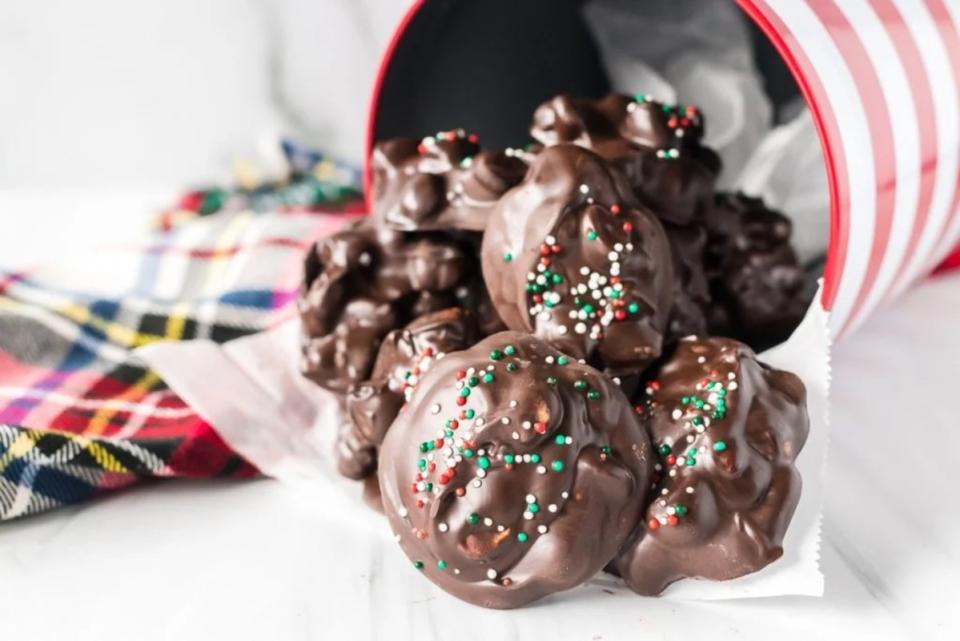 <p>Persnickety Plates</p><p>Perfect for gifts or a Christmas day dessert tray.</p><p><strong>Get the recipe: <a href="https://www.persnicketyplates.com/crockpot-peanut-clusters/" rel="nofollow noopener" target="_blank" data-ylk="slk:Crock Pot Peanut Clusters;elm:context_link;itc:0;sec:content-canvas" class="link ">Crock Pot Peanut Clusters</a></strong></p>