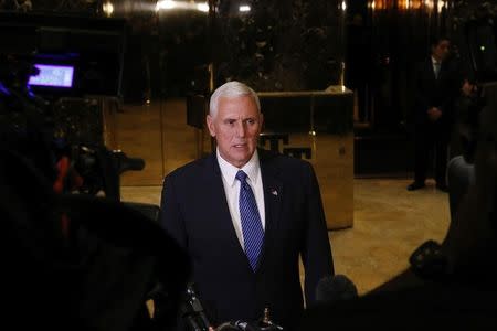 U.S. Vice President-elect Mike Pence speaks with the news media after a meeting at Trump Tower to speak with U.S. President-elect Donald Trump in New York, U.S., November 29, 2016. REUTERS/Lucas Jackson