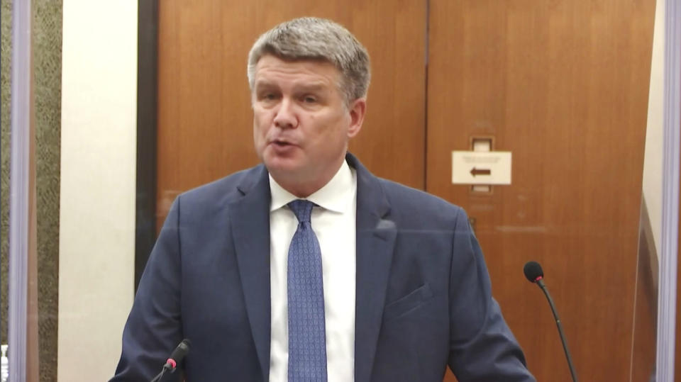 In this image taken from video, prosecutor Matthew Frank interviews witness Senior Special Agent James Reyerson of the Minnesota Bureau of Criminal Apprehension as Hennepin County Judge Peter Cahill presides Wednesday, April 7, 2021, in the trial of former Minneapolis police Officer Derek Chauvin at the Hennepin County Courthouse in Minneapolis. Chauvin is charged in the May 25, 2020 death of George Floyd. (Court TV via AP, Pool)