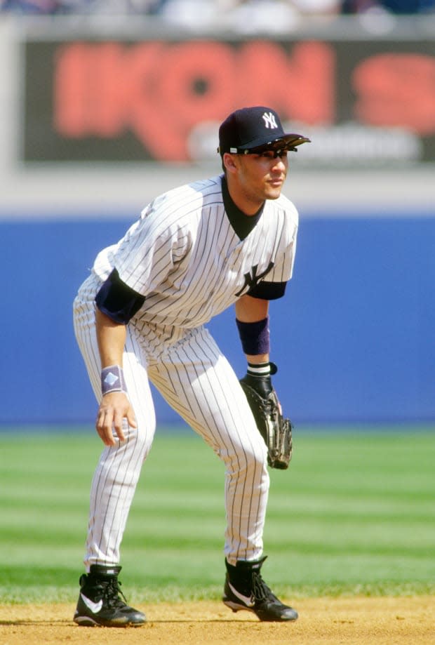 Derek Jeter of the New York Yankees is down and ready to make a play on the ball during an Major League Baseball game circa 1996 at Yankee Stadium in the Bronx borough of New York City. Jeter played for the Yankees from 1995-2014.<p><a href="https://www.gettyimages.com/detail/463915426" rel="nofollow noopener" target="_blank" data-ylk="slk:Focus On Sport/Getty Images;elm:context_link;itc:0;sec:content-canvas" class="link ">Focus On Sport/Getty Images</a></p>