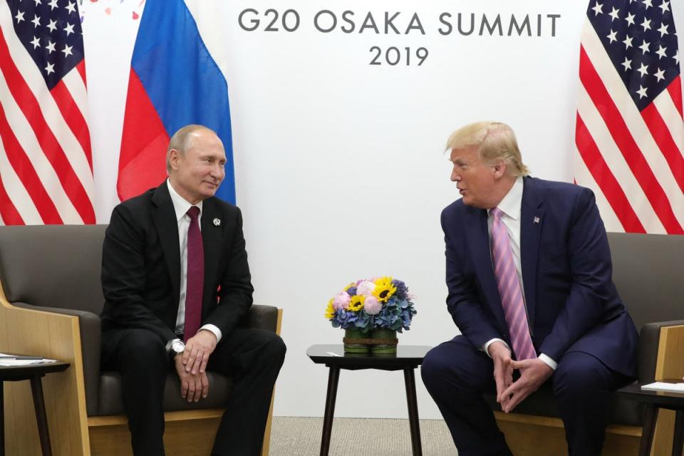 Russian President Vladimir Putin and US President Donald Trump hold a meeting on the sidelines of the G20 summit in Osaka on June 28, 2019 (SPUTNIK/AFP via Getty Images)