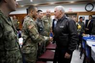 U.S. Vice President Mike Pence shakes hands with U.S. soldier during a meeting with U.S. and South Korean soldiers at Camp Bonifas near the truce village of Panmunjom, in Paju, South Korea, April 17, 2017. REUTERS/Kim Hong-Ji