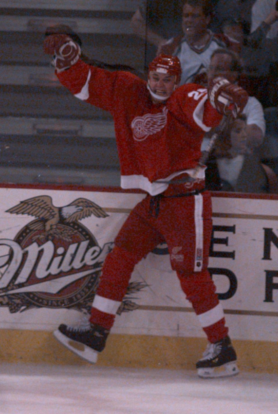 Detroit Red Wings' Darren McCarty raises his arms in jubilation after scoring the team's fourth goal late in the third period against the Colorado Avalanche during Game 2 of the Western Conference finals at McNichols Sports Arena in Denver, May 17, 1997.