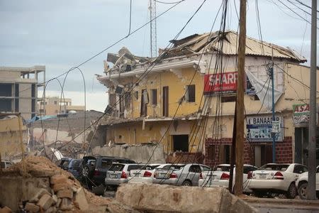 View of vehicles parked near the scene of a suicide bomb attack outside Nasahablood hotel in Somalia's capital Mogadishu, June 25, 2016. REUTERS/Feisal Omar