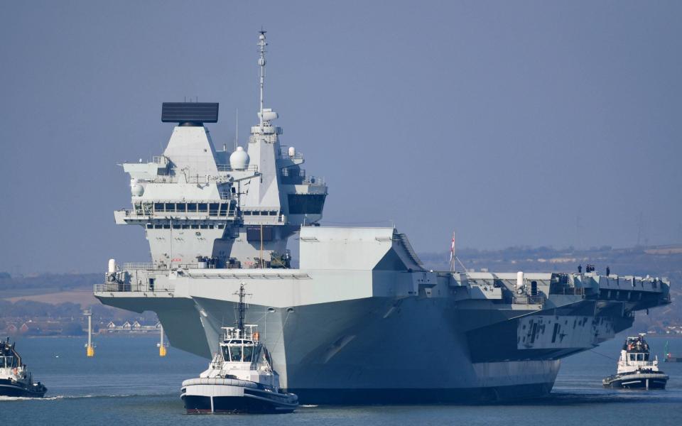 252239458 / c69af9a5-436b-3491-9f76-c58a8f41025a Image headline: HMS Queen Elizabeth Departs From Portsmouth Navy Base Original description: PORTSMOUTH, ENGLAND - MARCH 01: HMS Queen Elizabeth departs from the Naval base on March 01, 2021 in Portsmouth, England. The Â£3 billion aircraft carrier is expected to undertake an additional series of sea trials in preparation for her first active deployment planned to begin in May.  - Finnbarr Webster/Getty Images