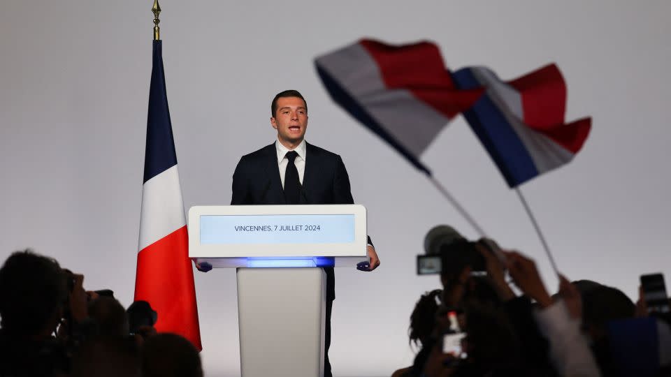 A disappointed Jordan Bardella speaks at an election night at the RN headquarters in Paris. - Kevin Coombs/Reuters