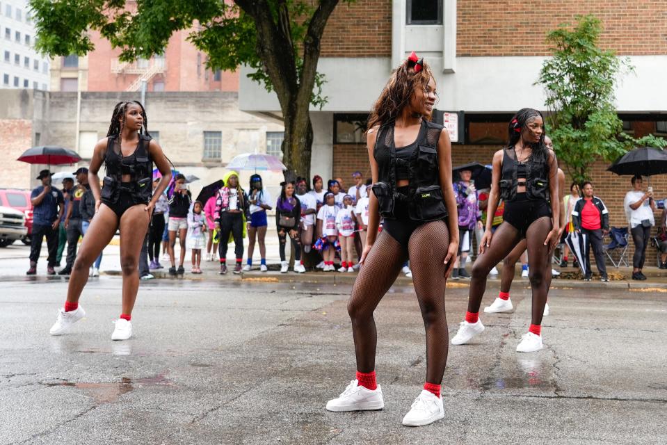 Dancers perform one last dance at the end of the 2nd Annual Cincinnati Official Juneteenth Parade along Court Street in Cincinnati on Monday, June 19, 2023.