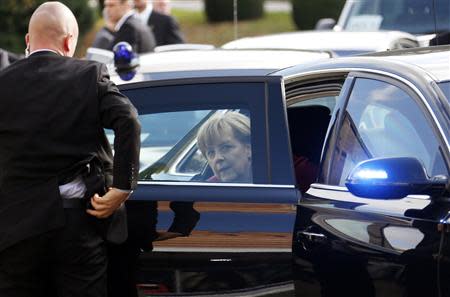 German Chancellor Angela Merkel arrives at an European People's Party (EPP) meeting in Meise near Brussels, ahead of an EU leaders summit October 24, 2013. REUTERS/Francois Lenoir