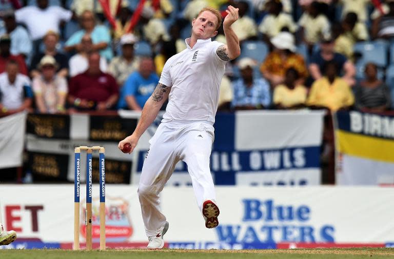 England's cricketer Ben Stokes delivers a ball during the second Test match between West Indies and England at the Grenada National Stadium in Saint George's on April 21, 2015