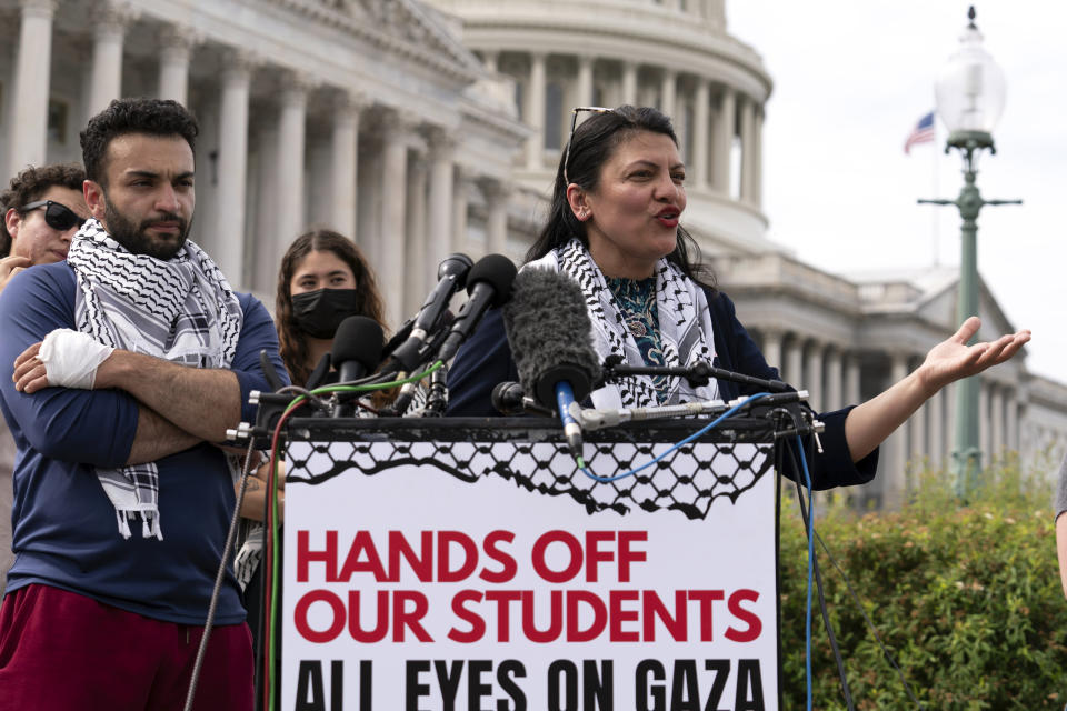 Rep. Rashida Tlaib, D-Mich., accompanied by George Washington University students speaks during a news conference at the U.S. Capitol, Wednesday, May 8, 2024, in Washington, after police cleared a pro-Palestinian tent encampment at George Washington University early Wednesday and arrested demonstrators. (AP Photo/Jose Luis Magana)