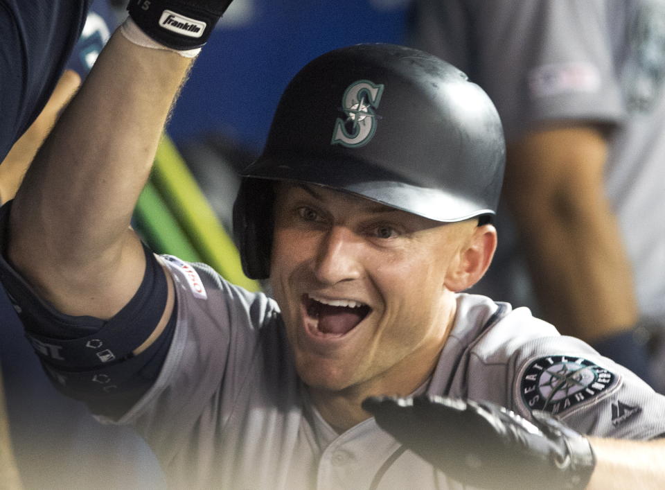 Seattle Mariners' Kyle Seager watches his solo home run against the Toronto Blue Jays during the eighth inning of a baseball game in Toronto on Saturday, Aug. 17, 2019. (Fred Thornhill/The Canadian Press via AP)