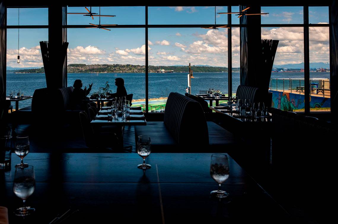 Floor-to-ceiling windows accentuate the views from Copper & Salt at the Silver Cloud Hotel Tacoma.