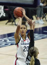 Connecticut forward Olivia Nelson-Ododa (20) shoots against Butler forward Ellen Ross (25) in the first half of an NCAA college basketball game Tuesday, Jan. 19, 2021, in Storrs, Conn. (David Butler II/Pool Photo via AP)