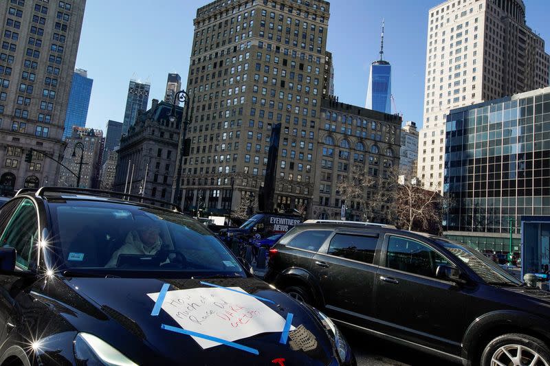 FILE PHOTO: Uber drivers protest blocking of pay raises