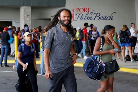 Passengers are shown after disembarking the Bahamas Paradise Cruise Line ship, Grand Celebration, in Riviera Beach