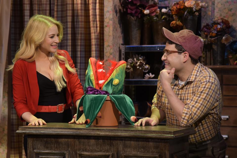 Samantha Duval, left, and Sam Seferian play co-workers in a Skid Row plant shop in “Little Shop of Horrors” at Florida Studio Theatre.